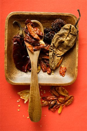 different spoons - Various dried chili peppers in wooden bowl Stock Photo - Premium Royalty-Free, Code: 659-01845033