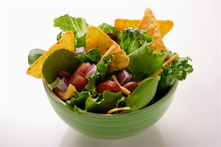 salad white background not dog not people - Mexican salad with vegetables and taco chips Stock Photo - Premium Royalty-Free, Code: 659-01845068