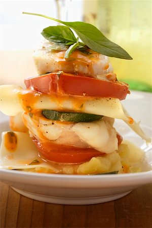 sea devil recipe - Monkfish lasagne with tomatoes and courgettes Stock Photo - Premium Royalty-Free, Code: 659-01845177