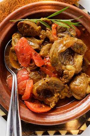 simsearch:659-08419605,k - Tajine de veau aux tomates (Afrique du Nord) Photographie de stock - Premium Libres de Droits, Code: 659-01845485