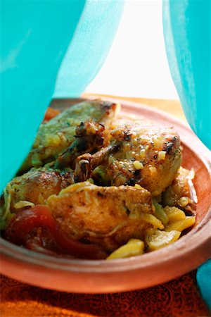 Chicken tajine with tomatoes (N. Africa) Stock Photo - Premium Royalty-Free, Code: 659-01845483