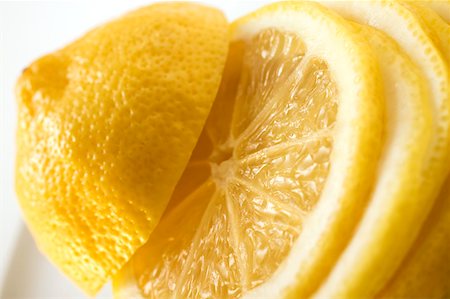 Lemon, sliced (close-up) Stock Photo - Premium Royalty-Free, Code: 659-01845556