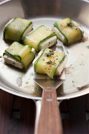 simsearch:659-01852978,k - Fried sheep's cheese wrapped in courgette with thyme Stock Photo - Premium Royalty-Free, Code: 659-01845719