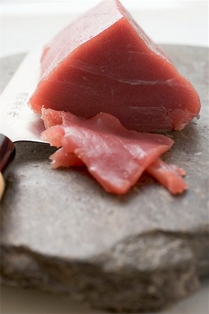 fresh cut fish - Tuna fillet, partly sliced Stock Photo - Premium Royalty-Free, Code: 659-01845897