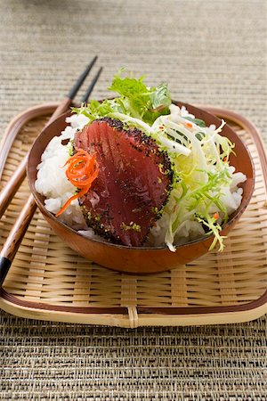 simsearch:851-02961173,k - Raw tuna fillet with poppy seeds, rice and salad Stock Photo - Premium Royalty-Free, Code: 659-01845925