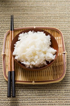 simsearch:659-03527071,k - Bowl of rice and chopsticks on tray Stock Photo - Premium Royalty-Free, Code: 659-01845922