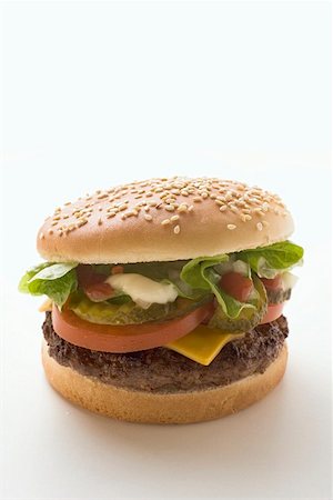 simsearch:659-01846088,k - Classic cheeseburger Foto de stock - Sin royalties Premium, Código: 659-01846075