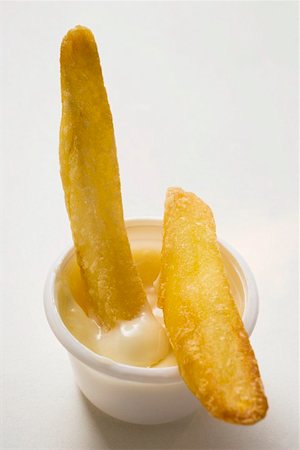 Chips with mayonnaise Foto de stock - Sin royalties Premium, Código: 659-01846125