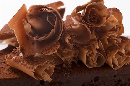 Chocolate curls on chocolate cake Stock Photo - Premium Royalty-Free, Code: 659-01846162
