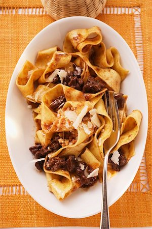 Pappardelle with meat ragout with Barolo & Parmesan shavings Stock Photo - Premium Royalty-Free, Code: 659-01846197