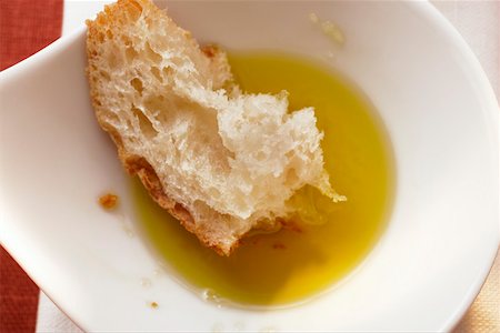 Olive oil with white bread Stock Photo - Premium Royalty-Free, Code: 659-01846212