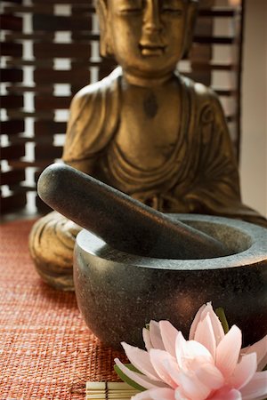 simsearch:659-01846629,k - Mortar with pestle in front of Buddha (Asia) Stock Photo - Premium Royalty-Free, Code: 659-01846419