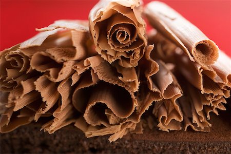 decorated chocolate gateau - Chocolate curls on chocolate cake Stock Photo - Premium Royalty-Free, Code: 659-01846412