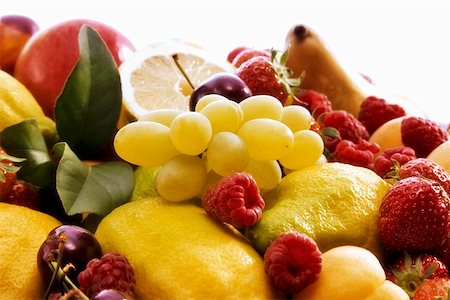 different type fruit - Fruit still life with grapes, berries and lemons Stock Photo - Premium Royalty-Free, Code: 659-01846566