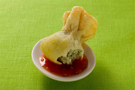 popovers - Wonton with sweet and sour sauce Stock Photo - Premium Royalty-Free, Code: 659-01846684