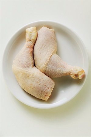 Two chicken legs on plate Foto de stock - Sin royalties Premium, Código: 659-01846736