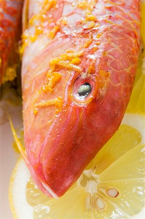 Red mullet with lemon sauce (close-up) Stock Photo - Premium Royalty-Free, Code: 659-01846914