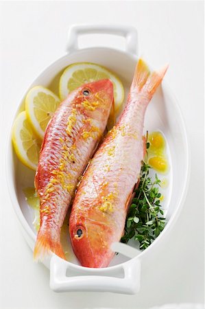 Red mullet with lemon sauce and thyme Stock Photo - Premium Royalty-Free, Code: 659-01846912