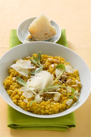 rice dish - Risotto with sage, pine nuts and Parmesan Stock Photo - Premium Royalty-Free, Code: 659-01847087