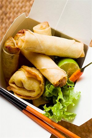 Deep-fried wontons and spring rolls to take away Stock Photo - Premium Royalty-Free, Code: 659-01847280