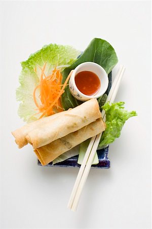 Spring rolls on salad with sweet and sour sauce (Thailand) Foto de stock - Sin royalties Premium, Código: 659-01847297