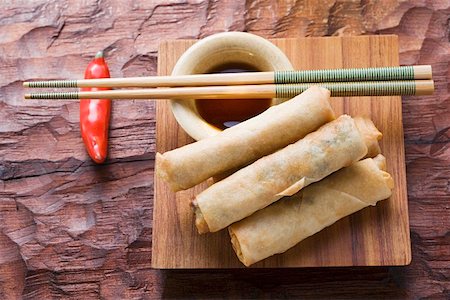 south east asian cooking - Spring rolls with soy sauce (Thailand) Stock Photo - Premium Royalty-Free, Code: 659-01847313