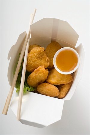 simsearch:659-06372860,k - Chicken Nuggets with sweet and sour sauce to take away Foto de stock - Sin royalties Premium, Código: 659-01847430