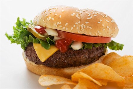 simsearch:659-01847504,k - Cheeseburger with potato crisps Stock Photo - Premium Royalty-Free, Code: 659-01847493