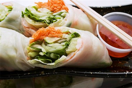 spring roll - Vietnamese spring rolls with chili sauce to take away Stock Photo - Premium Royalty-Free, Code: 659-01847516