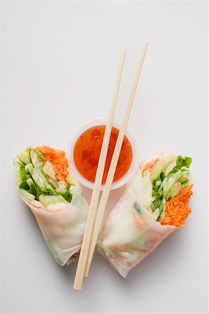 springroll - Vietnamese spring rolls with chili sauce to take away Stock Photo - Premium Royalty-Free, Code: 659-01847517