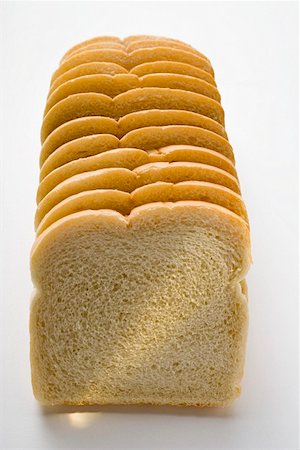 sliced bread - White sliced bread Foto de stock - Sin royalties Premium, Código: 659-01847742