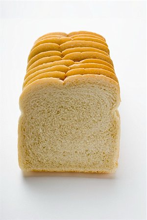 sliced bread - White sliced bread Foto de stock - Sin royalties Premium, Código: 659-01847743