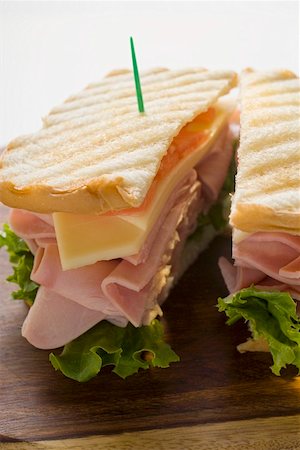 sandwich toast - Toasted ham, cheese and tomato sandwich Stock Photo - Premium Royalty-Free, Code: 659-01847752