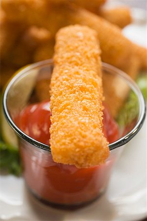 fish sticks - Fish finger with ketchup Stock Photo - Premium Royalty-Free, Code: 659-01847792