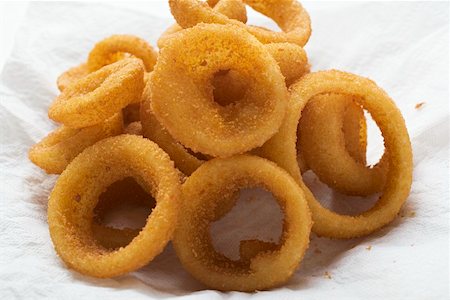 Deep-fried onion rings Foto de stock - Sin royalties Premium, Código: 659-01847896