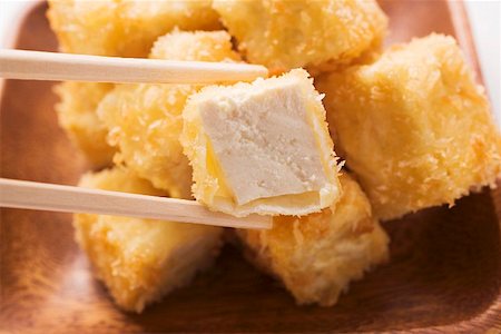 Breaded tofu cubes (Asia) Foto de stock - Sin royalties Premium, Código: 659-01847893