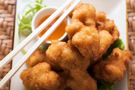 Asian chicken nuggets with apricot sauce Stock Photo - Premium Royalty-Free, Code: 659-01847946