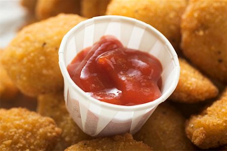 simsearch:659-03528405,k - Chicken nuggets with ketchup Stock Photo - Premium Royalty-Free, Code: 659-01847941
