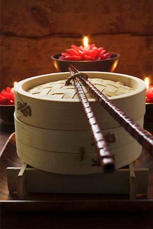 simsearch:659-01846629,k - Bamboo steamer in front of burning candles (Asia) Stock Photo - Premium Royalty-Free, Code: 659-01847988