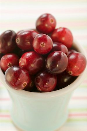 Cranberries in small white bowl Stock Photo - Premium Royalty-Free, Code: 659-01848133