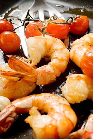 Fried shrimps with cherry tomatoes Stock Photo - Premium Royalty-Free, Code: 659-01848144