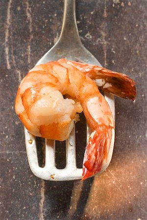 fried shrimp - Fried shrimp on spatula Stock Photo - Premium Royalty-Free, Code: 659-01848177