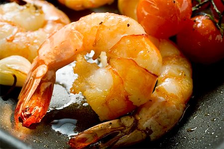 fried shrimp - Fried shrimps with cherry tomatoes Stock Photo - Premium Royalty-Free, Code: 659-01848212