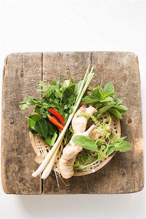 Fresh Thai herbs and spices in basket Stock Photo - Premium Royalty-Free, Code: 659-01848227