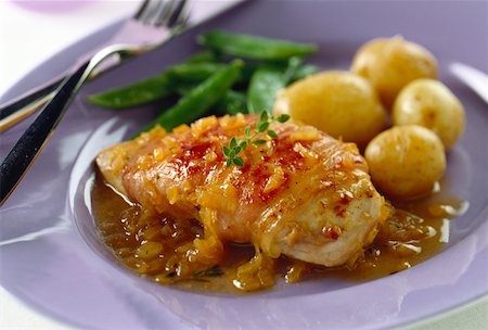 side dish with chicken - Chicken breast wrapped in ham with onions sauce, potatoes Stock Photo - Premium Royalty-Free, Code: 659-01848497
