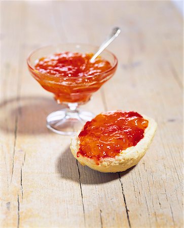 spread - Apricot and redcurrant jam on roll and in glass fish Stock Photo - Premium Royalty-Free, Code: 659-01848511