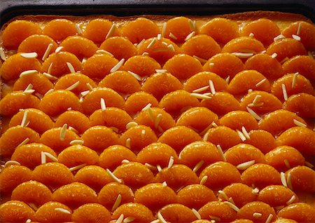 Tray-baked mandarin cake Foto de stock - Sin royalties Premium, Código: 659-01848583