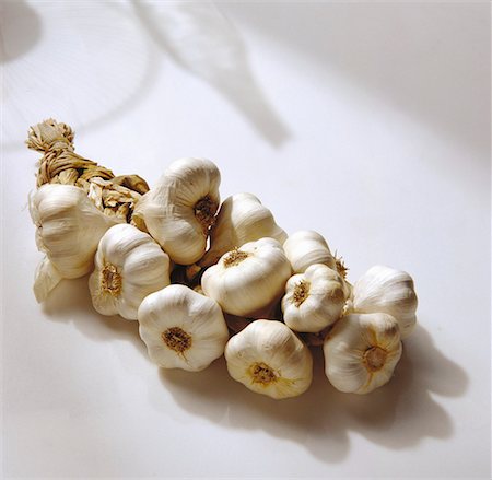 A Garlic Braid Foto de stock - Sin royalties Premium, Código: 659-01848808