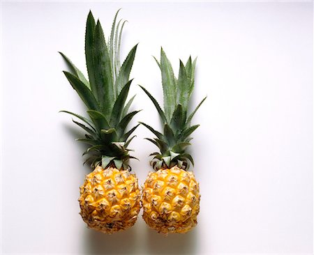 Two baby pineapples Stock Photo - Premium Royalty-Free, Code: 659-01848872