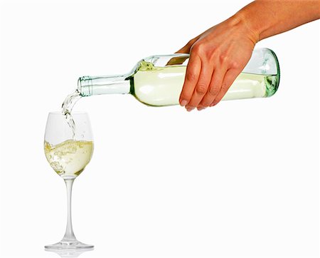 simsearch:659-01848940,k - Woman's hand pouring white wine Foto de stock - Sin royalties Premium, Código: 659-01849048